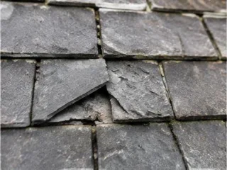 Cracked and slipped roof slates